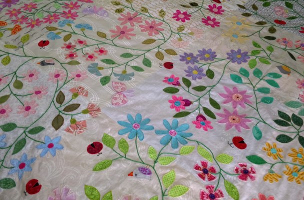 meadow quilt blanket stitch raw edge applique flower leaf vine ladybug bird