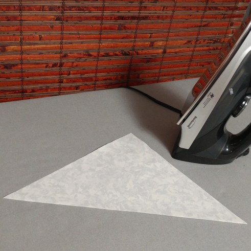 corner quilt label pressed